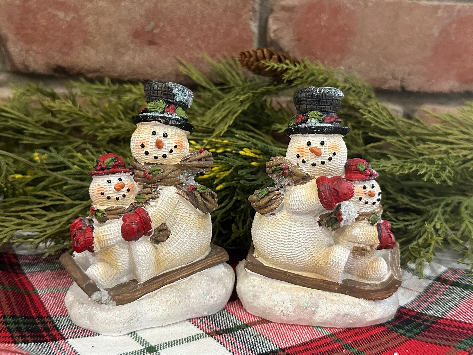 Snowmen on Sled