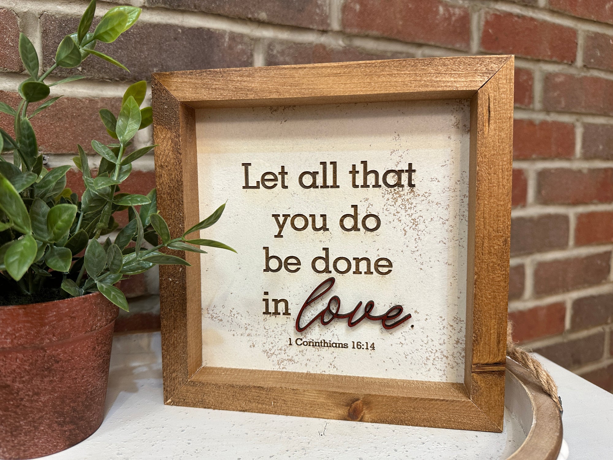 Handmade Let all that you do framed sign