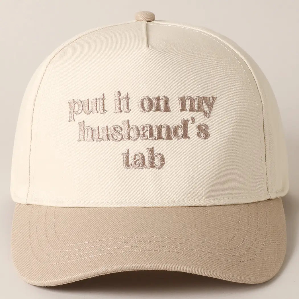 Put it on my Husbands Tab Trucker Hat