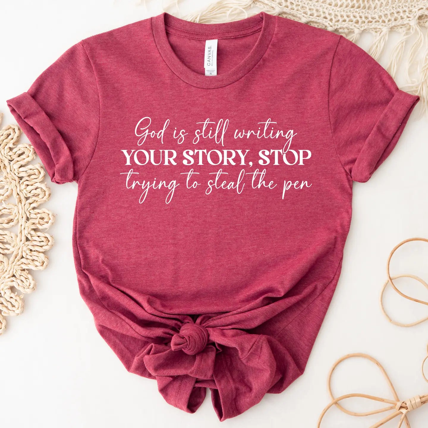 God is still writing your story graphic tee