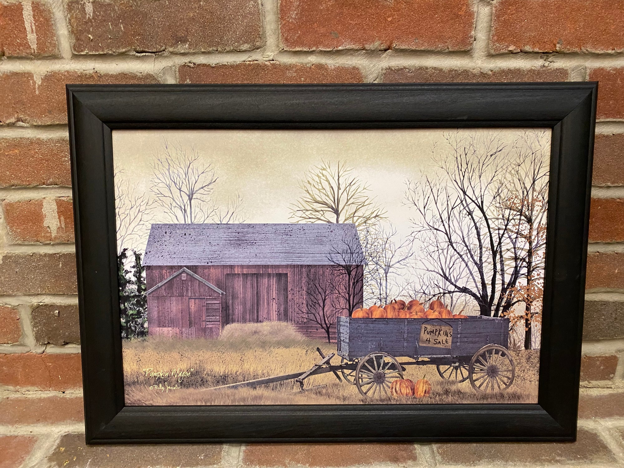 Pumpkin Wagon Framed Print